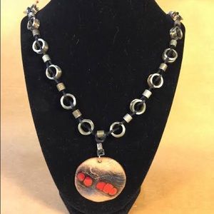 Round pendant w/clear black & red frit necklace